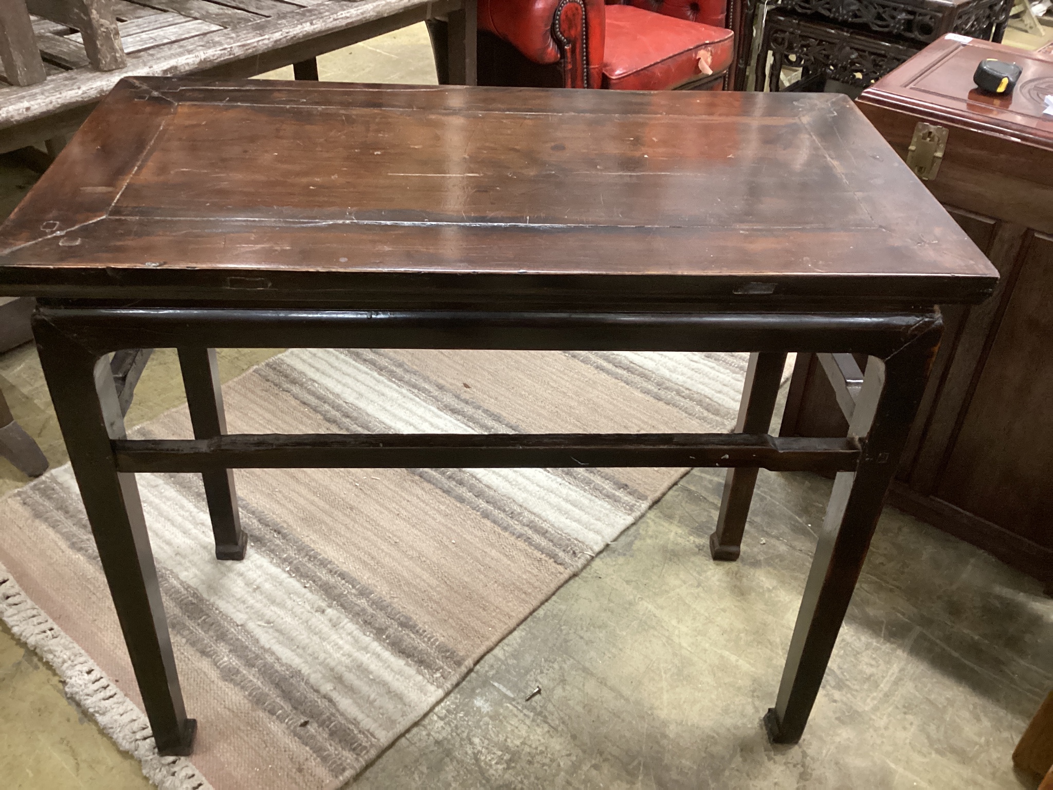 A Chinese rectangular hardwood side table width 96cm, depth 48cm, height 85cm.